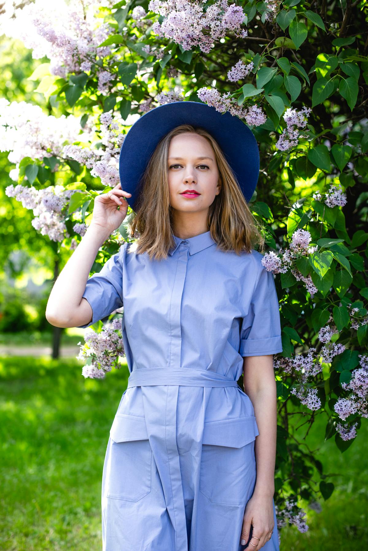 Modern living space with neutral colors, a stylish desk, and cozy seating showing a flexible work-from-home setup