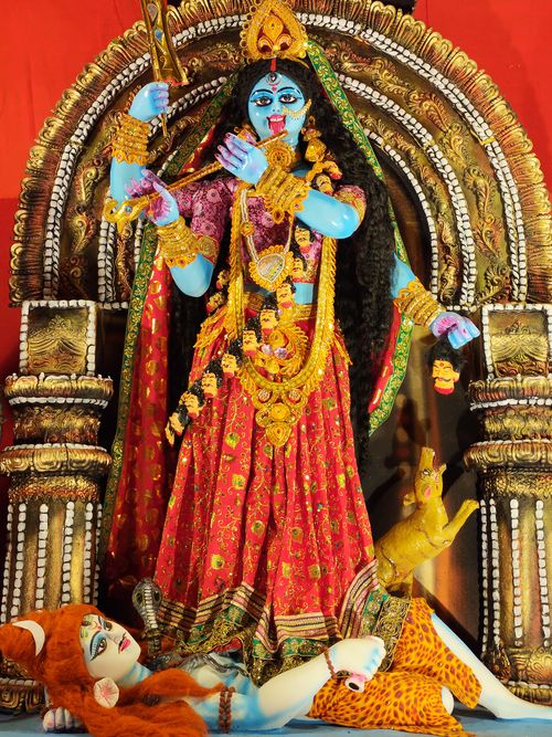 Free Colorful statue of Goddess Kali adorned with ornaments, symbolizing power and spirituality. Stock Photo