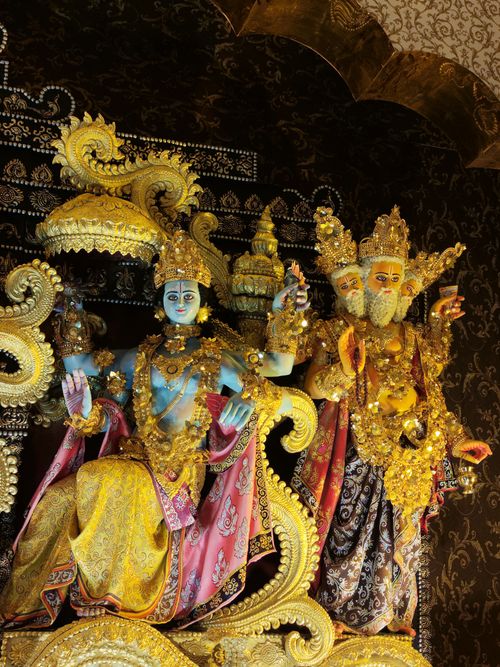 Free Colorful and ornate statues of Hindu deities featuring intricate craftsmanship. Stock Photo