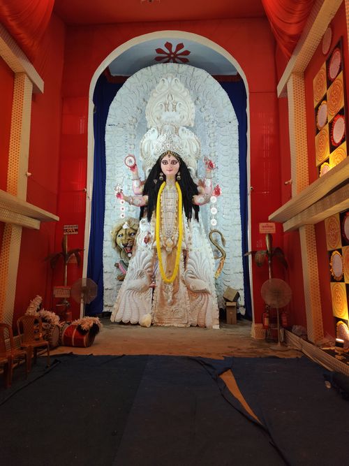 Free Stunning Durga idol in a colorful temple, showcasing intricate artistry. Stock Photo