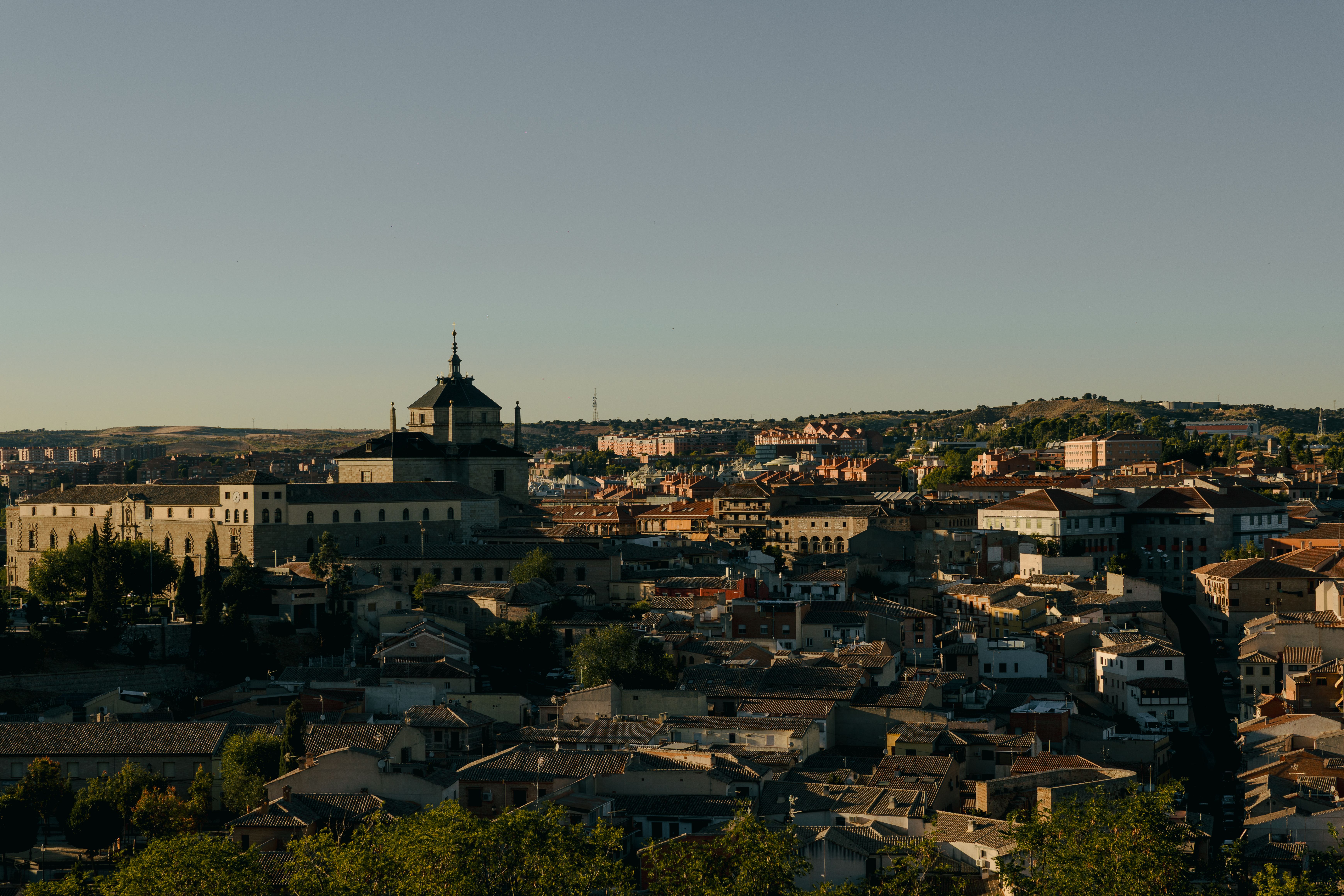 Captivating aerial view of Toledo, Spain's historic architecture at twilight. Perfect for travel themes.