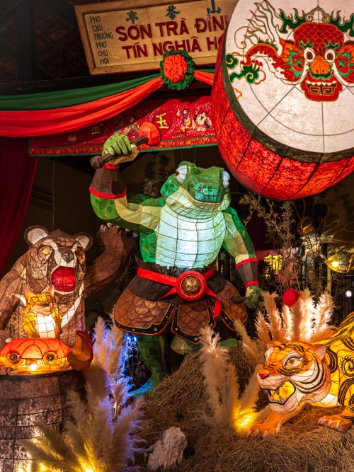 Free Colorful animal lanterns illuminated at a night festival celebration. Stock Photo