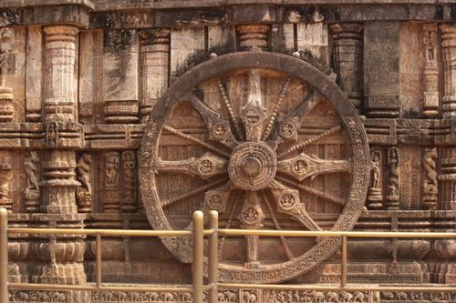Free Close-up of the intricately carved stone wheel at Konark Sun Temple, Odisha, India. Stock Photo