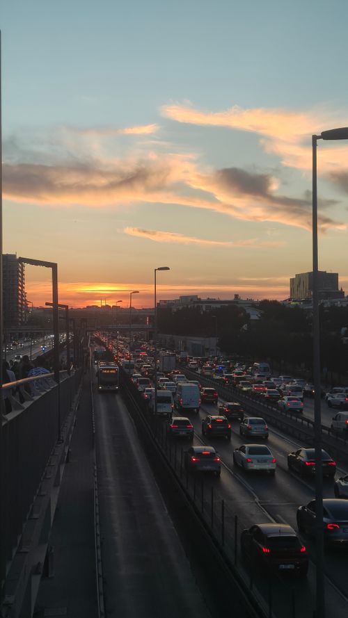 Free Busy highway in Istanbul during sunset, capturing vibrant traffic and urban skyline. Stock Photo