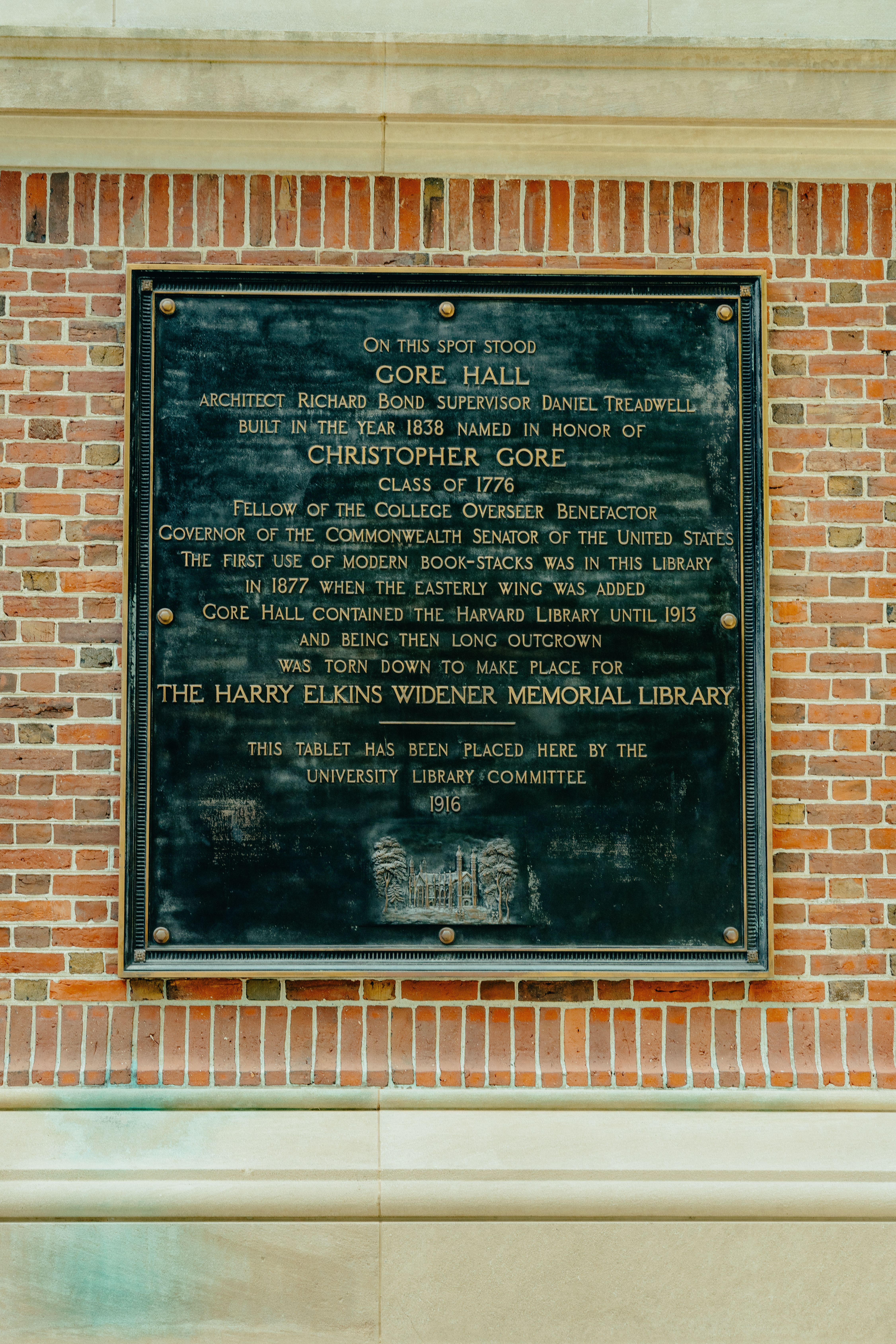 Plaque commemorating Gore Hall's history at Harvard University.