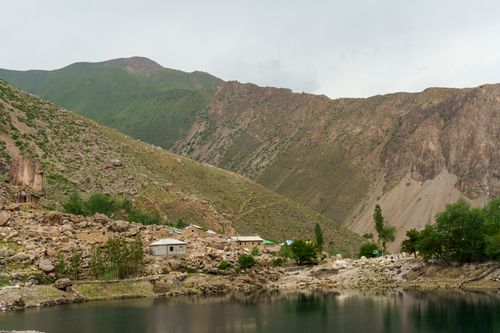 Free Tranquil view of Fann Mountains in Sughd, Tajikistan, with serene lake and rural scenery. Stock Photo