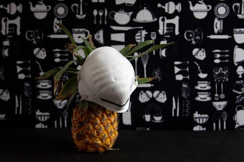 Free Face Mask on Pineapple Stock Photo