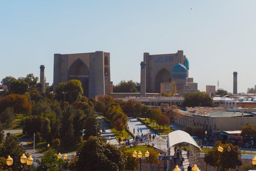 Captivating aerial view of Samarkand, showcasing ancient architecture and bustling urban life.
