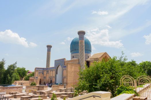 Discover the historic beauty of Gur-e-Amir Mausoleum with its iconic azure dome in Samarkand, Uzbekistan.