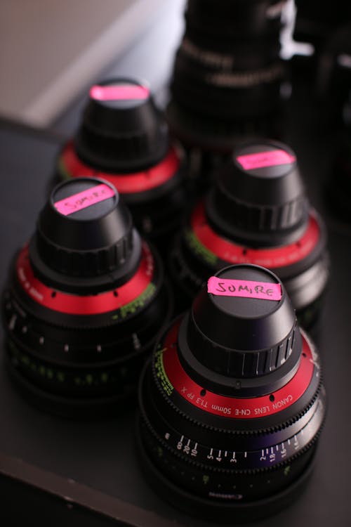 Free Camera Lenses On Black Surface Stock Photo
