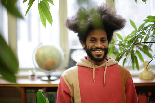 Man in Pink Hoodie Smiling