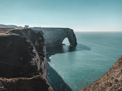 Free Breathtaking view of iconic cliffs and sea at Étretat, France showcasing natural beauty. Stock Photo
