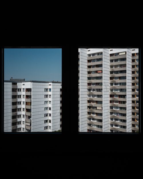 Free View of Berlin's iconic Plattenbau buildings showcasing modern urban architecture. Stock Photo