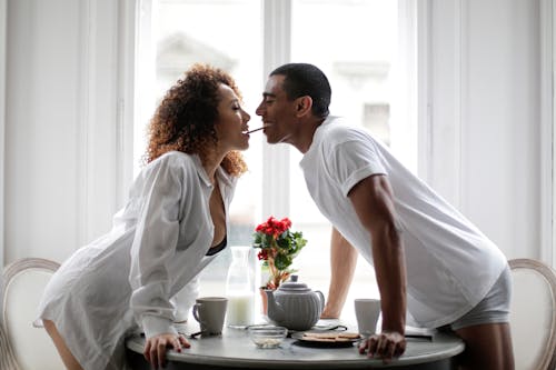 Romantic Couple Sharing Biscuit