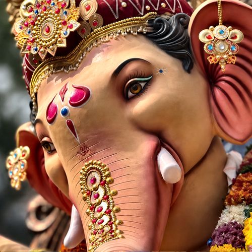 Free Close-up of a beautifully adorned Ganesh idol during Ganesh Chaturthi celebration in Mumbai, India. Stock Photo