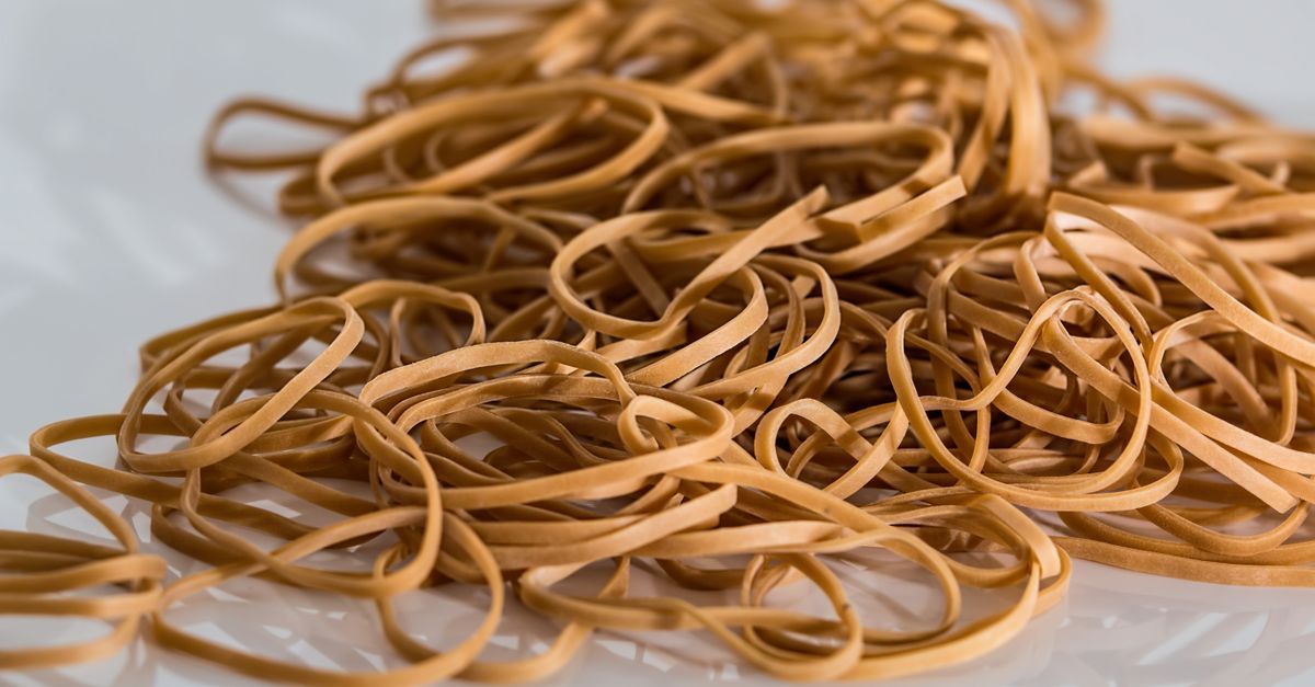 A close-up image of a scattered pile of brown rubber bands on a reflective surface. - Evidence evidence guide for soy isoflavones skin elasticity meta-analysis