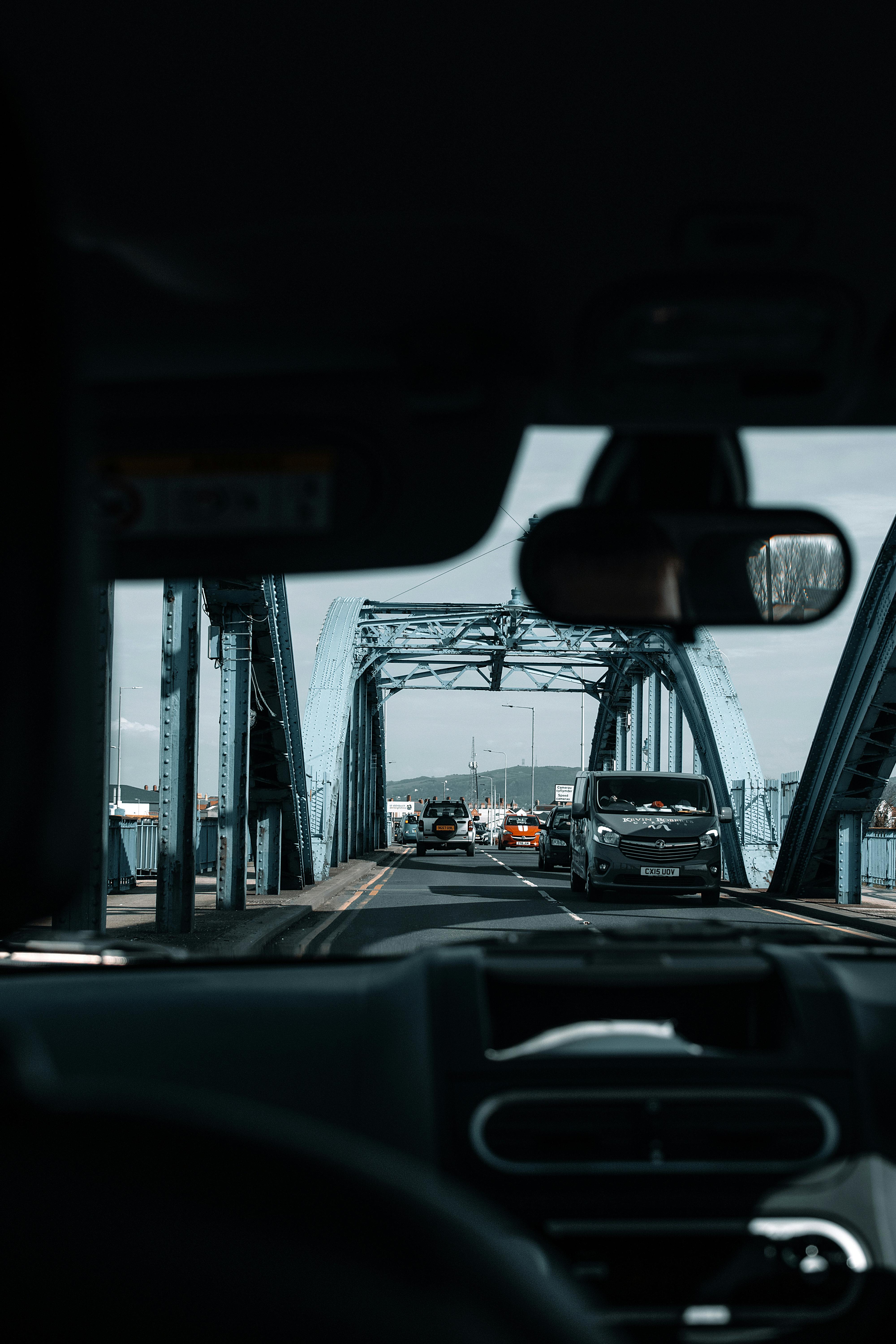 View from a car driving across a bridge in Rhyl, Wales, capturing a busy road scene.