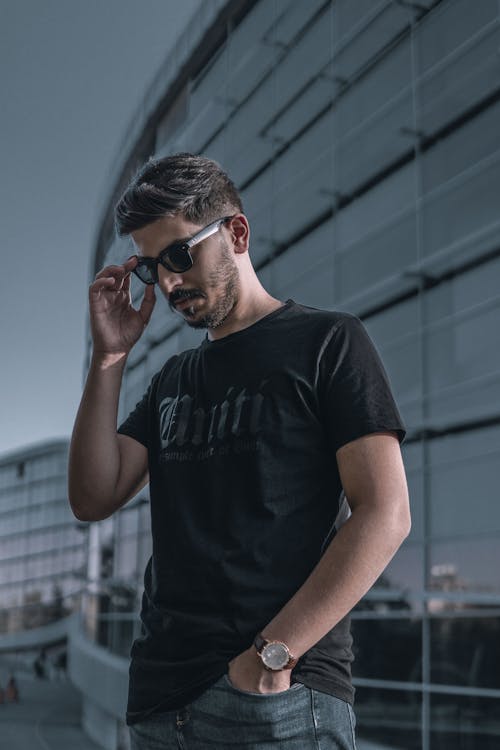 Man in Black Crew Neck T-shirt Wearing Black Sunglasses