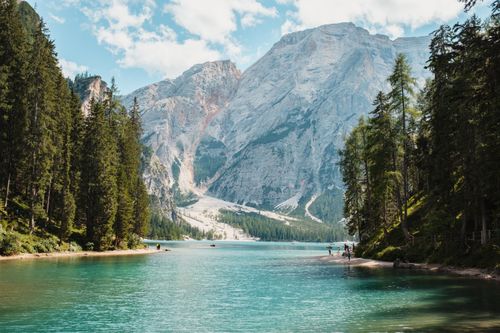 Free Breathtaking view of Pragser Wildsee with turquoise waters and majestic Dolomites in Italy. Stock Photo