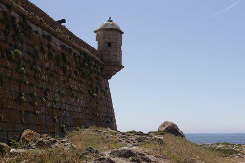 Free A rugged stone fort with a bastion, overlooking the sea on a sunny day. Stock Photo