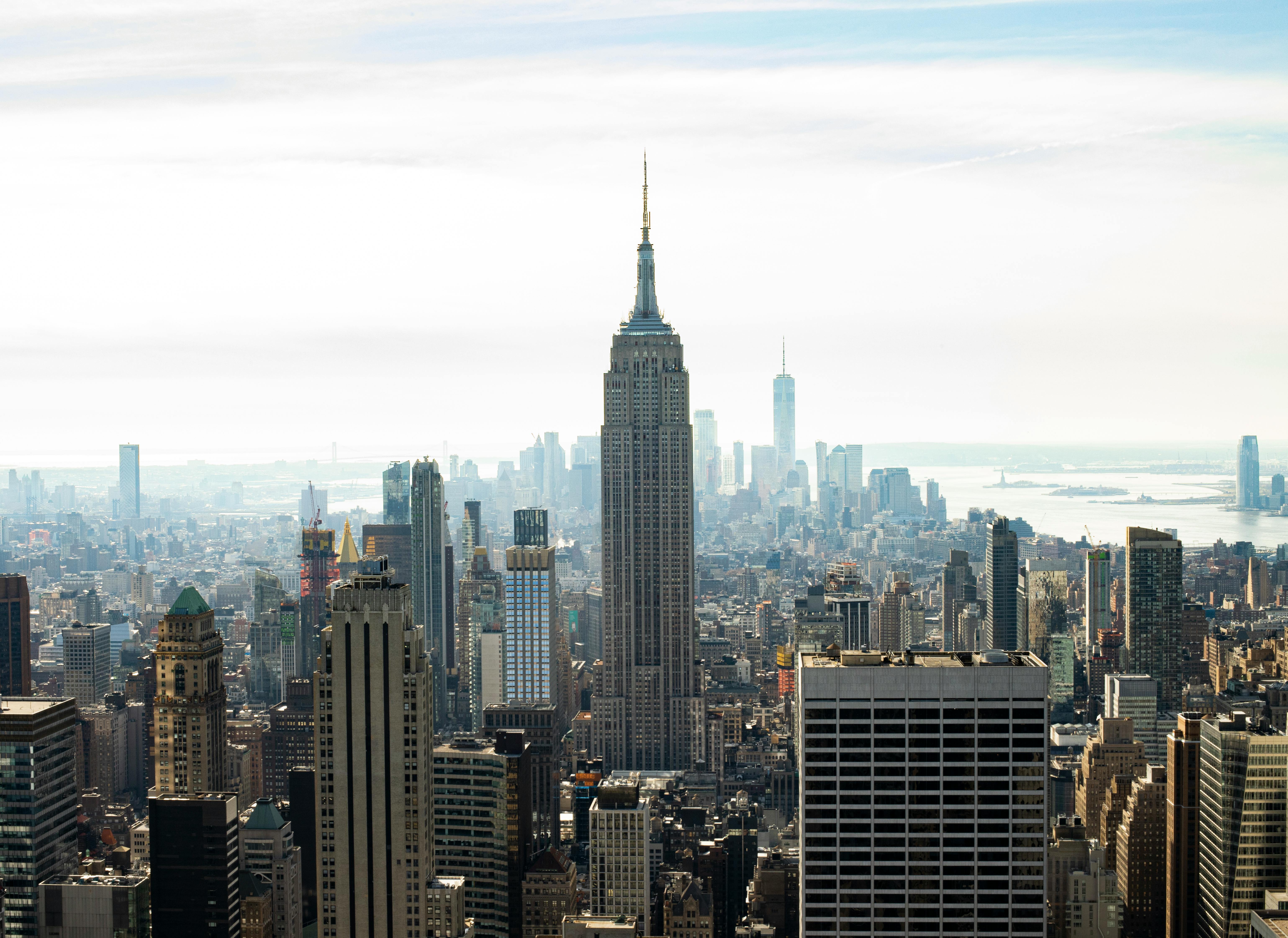 city skyline under white sky