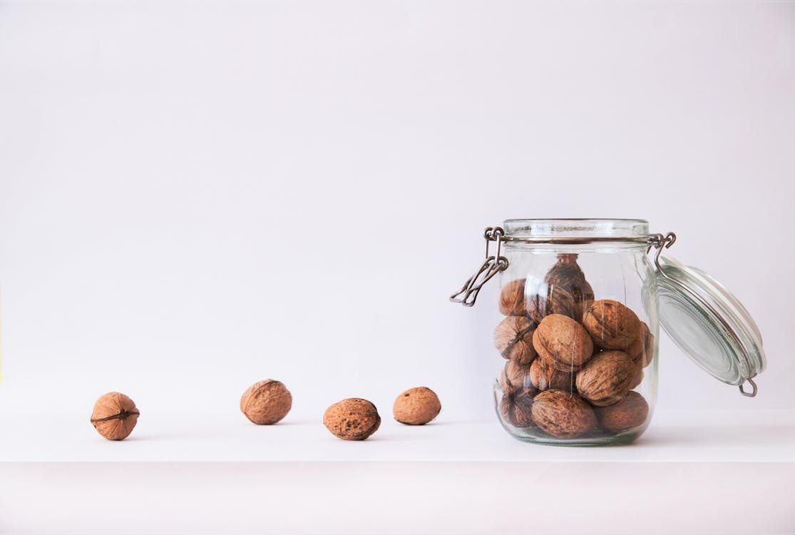 walnut-in-clear-glass-jar