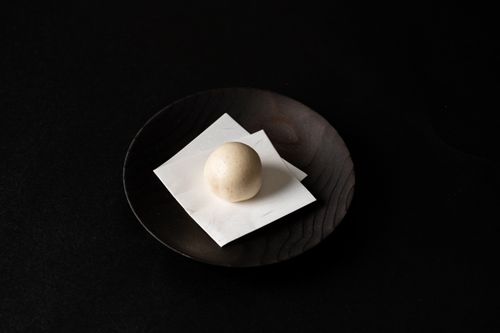 Free Simple and elegant Japanese dessert Wagashi served on a wooden plate in Tokyo, Japan. Stock Photo
