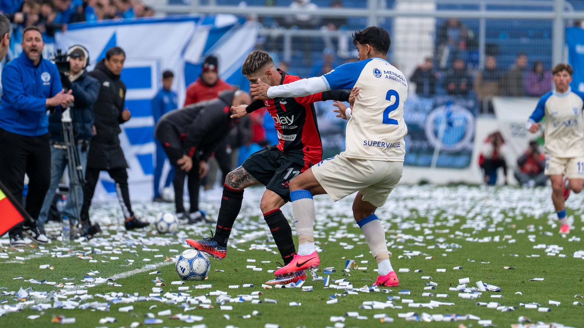 Smartphone showing a fantasy football captain selection screen during a crowded matchday