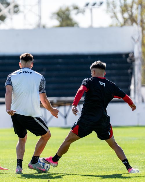 Free Two soccer players in training action on a sunny day. Stock Photo