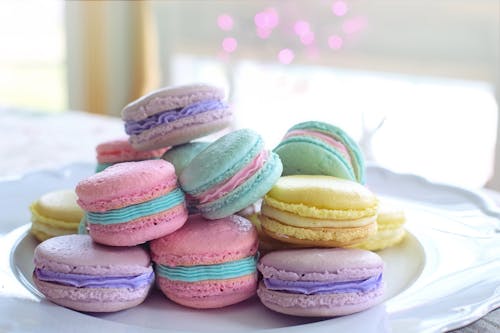 Colorful Macarons on White Ceramic Plate For Easter