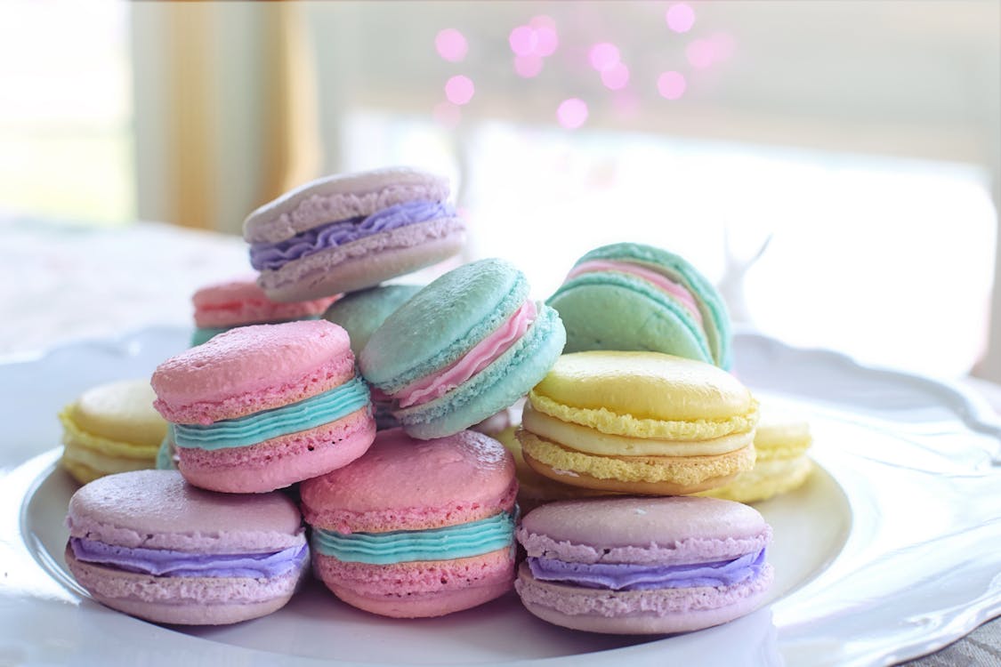 Free Colorful Macarons on White Ceramic Plate For Easter Stock Photo