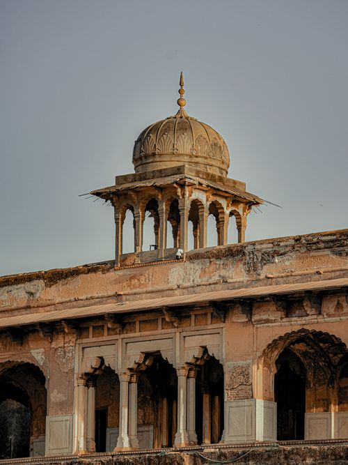 Free A classic dome structure with intricate design on an ancient building facade, highlighting architectural beauty. Stock Photo
