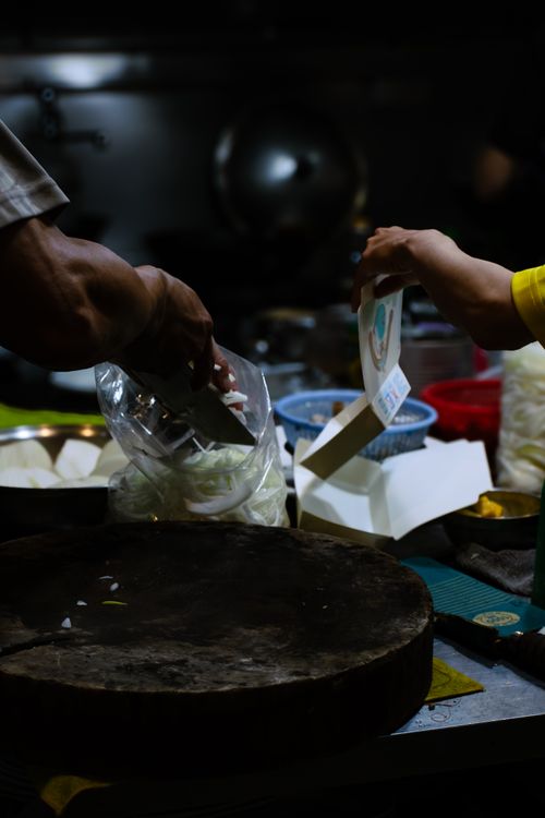 Free stock photo of food, hands, packaging Stock Photo