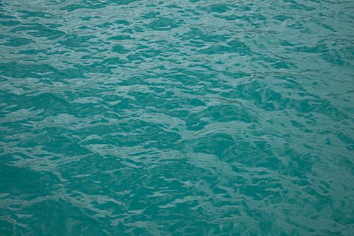 Free A serene view of turquoise water ripples creating a calming visual effect, captured outdoors in Türkiye. Stock Photo