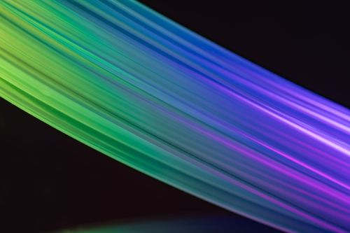 Free Colorful light trails create an abstract, dynamic pattern with vibrant hues. Stock Photo
