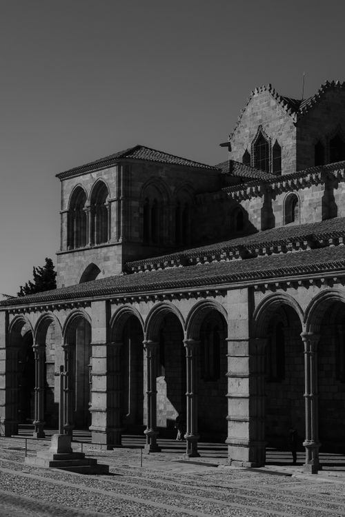Free Black and white photo of Ávila Cathedral, showcasing its Romanesque architecture style. Stock Photo