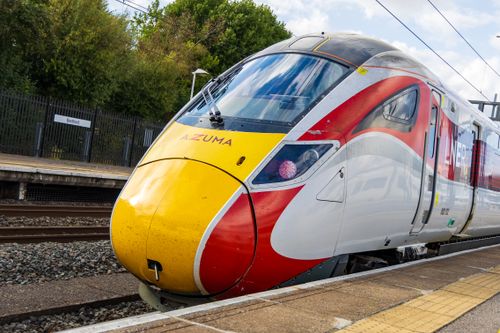 Free Azuma train at Bedford Station, England, on a sunny day showcasing British rail travel. Stock Photo