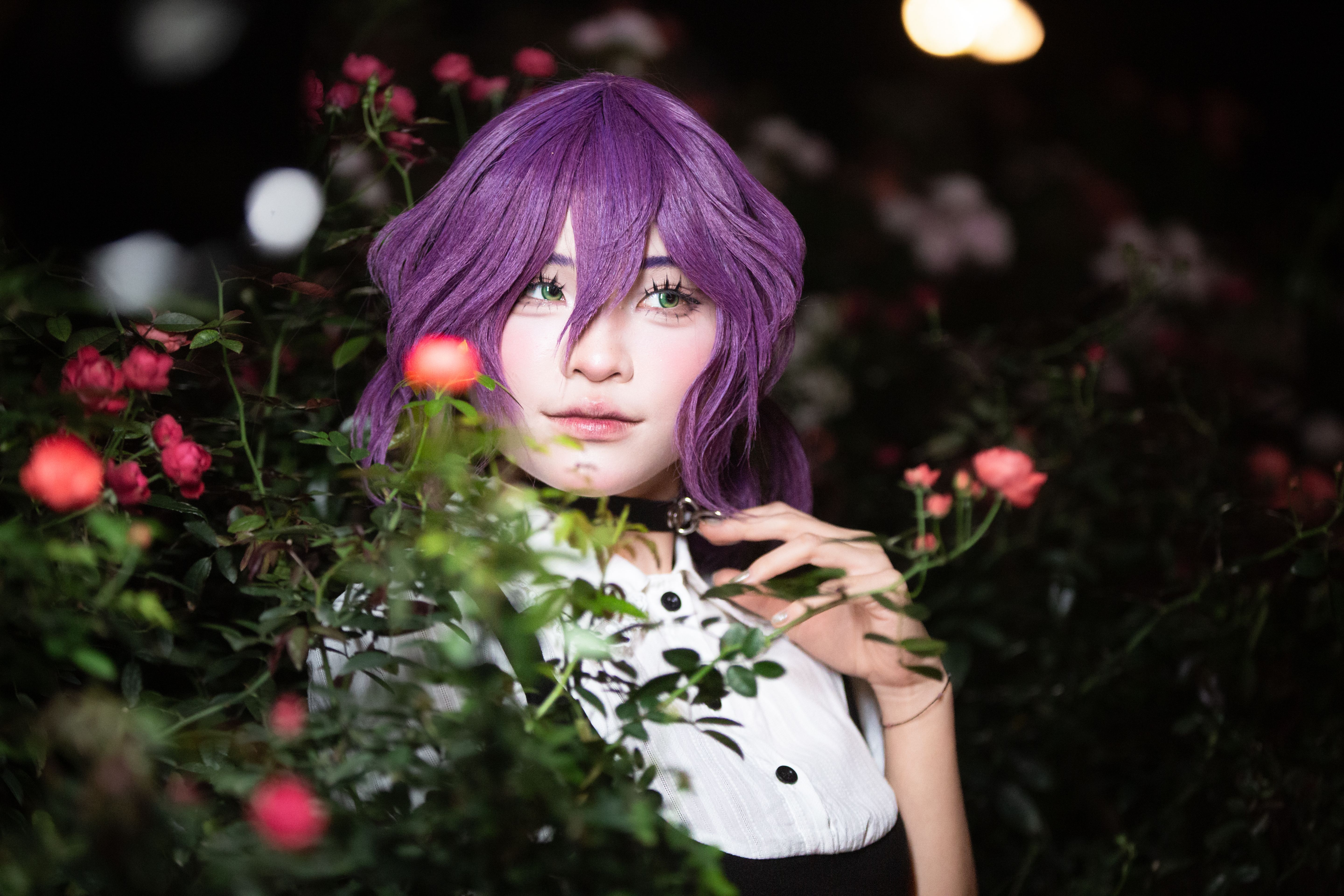 A captivating portrait of a woman in cosplay amidst a lush garden, highlighting purple hair and floral surroundings.