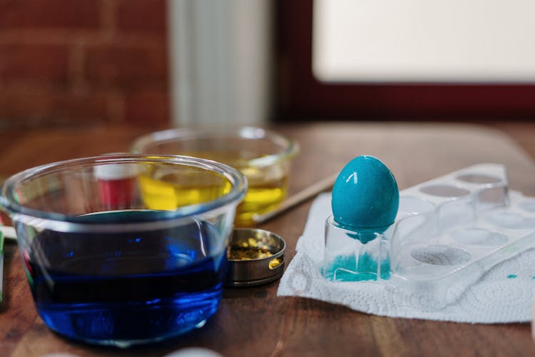 Blue Egg On Clear Plastic Tray