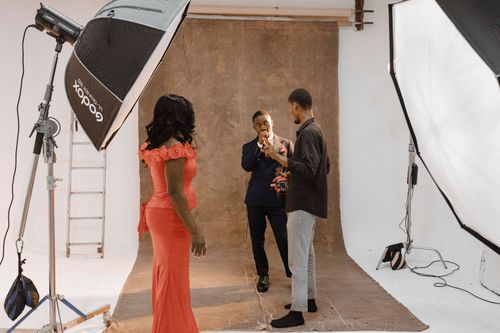 Free A behind-the-scenes look at a photo shoot in a professional studio in Accra, Ghana. Stock Photo