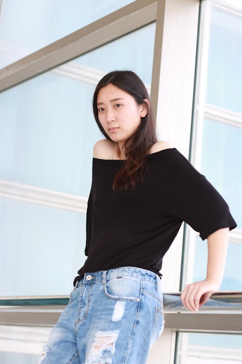 Woman Wearing Black Scoop-neck Shirt