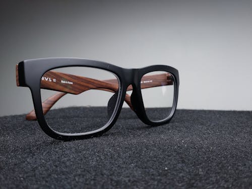 Black Framed Eyeglasses on Black Surface