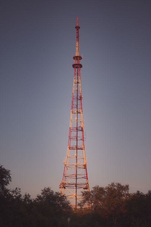 Free A tall television transmission tower in Aktobe, Kazakhstan against a serene evening sky. Stock Photo