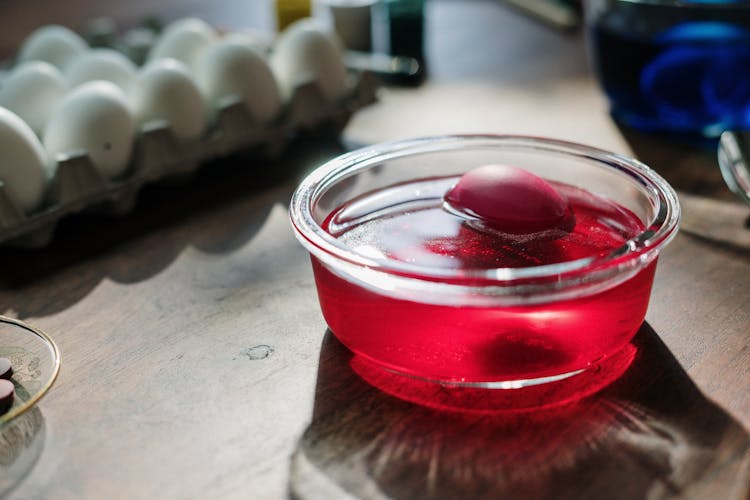 Egg Dip In Red Liquid