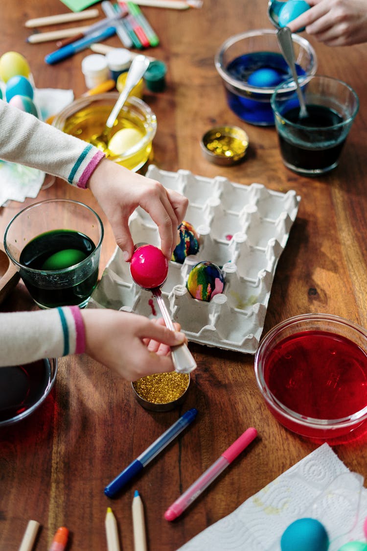 Person Making Tie Dye Easter Egg