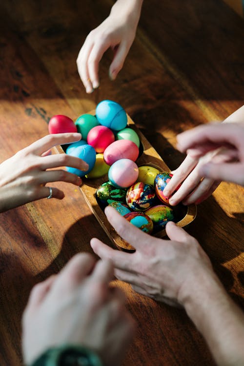 People  Holding Assorted Easter Eggs