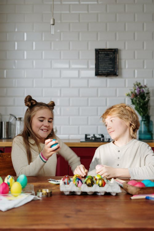 Free Kids Making Easter Eggs Stock Photo