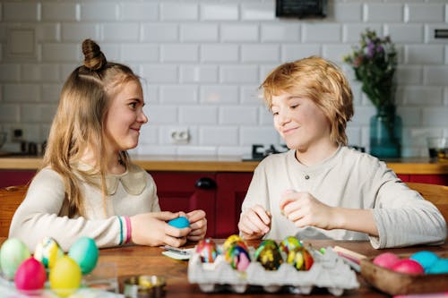 Free Kids Playing with Easter Eggs Stock Photo