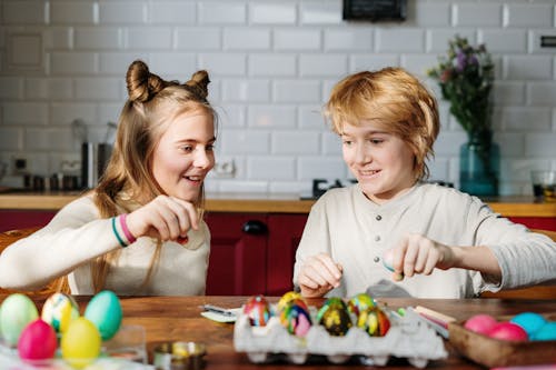 Free Kids Playing with Easter Eggs Stock Photo