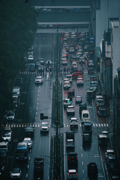 Free Aerial view of busy traffic on a rainy day in Baguio City, showcasing urban life. Stock Photo